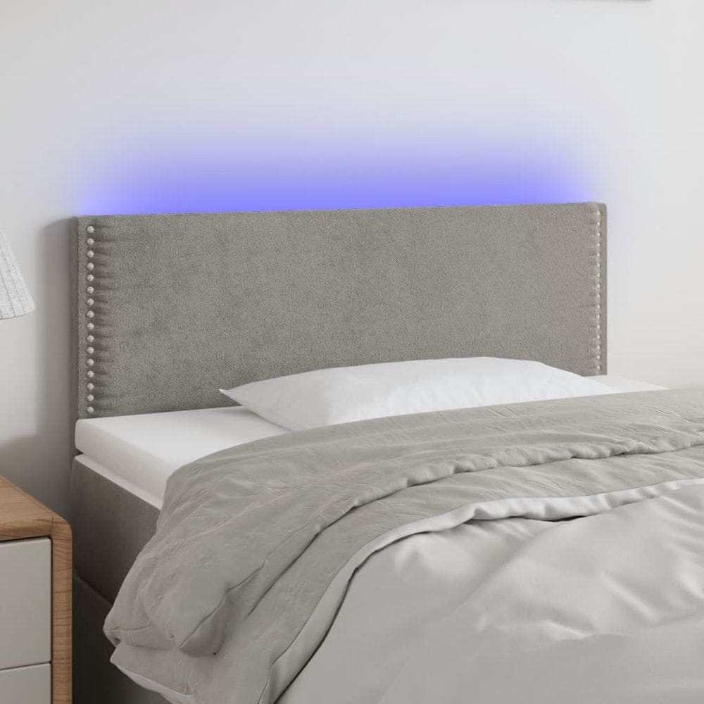 Vidaxl Čelo postele s LED bledosivé 100x5x78/88 cm zamat